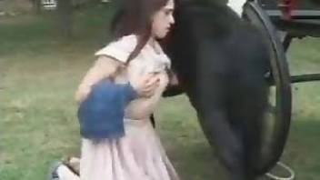 Horse screws a slender girl in her tight cunt