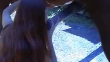 Cutesy young girl fucked by horse