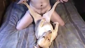 Dude fucking dog in a passionate porn vid